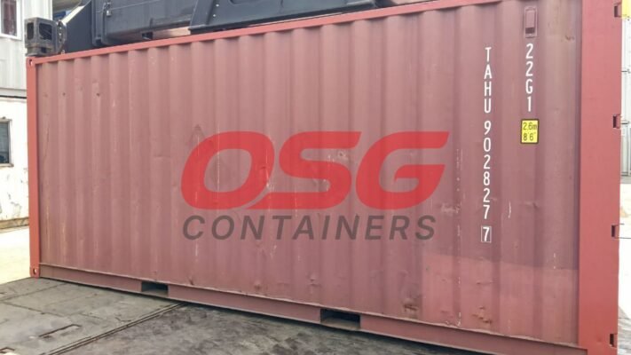 A large red shipping container with OSG Containers logo.