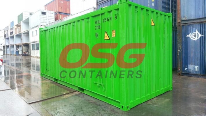 A bright green shipping container with OSG logo on it.